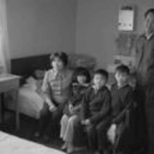 [Family in their single-room home in Chinatown]
