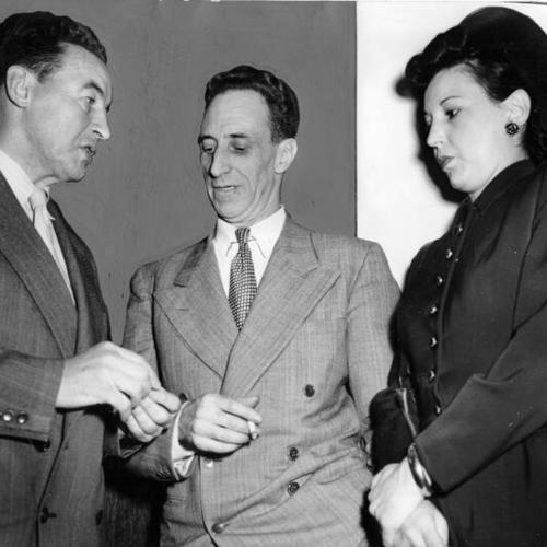 [Harry Bridges (center) with his wife, and attorney Vincent Hallinan]