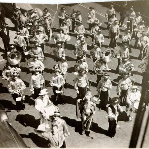 [San Francisco Municipal Band marching in costume during the Golden Gate Bridge Fiesta Parade]
