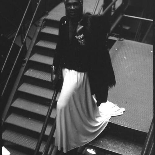 Sylvester standing on stairwell in alley between Curran and Geary theatres