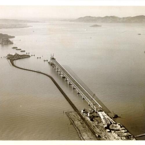 [Aerial view of Oakland portion of Bay Bridge under construction]