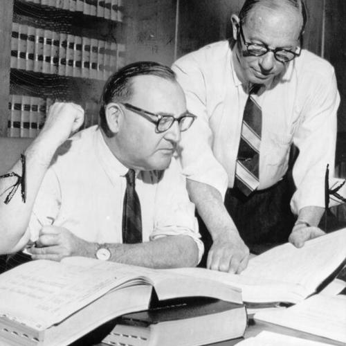 [Governor Edmund Brown and Bert W. Levit work on state budget]