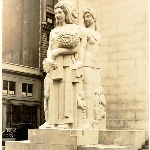 [Ralph Stackpoles' sculptured figure of women flanks the exterior of the Stock Exchange]