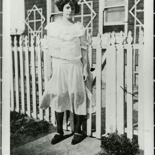 [John's sister in front of house on 24th Avenue]