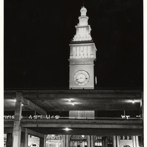 [View of Embarcadero Freeway and Ferry Building at night]