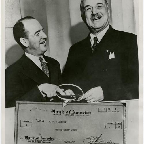 [A.P. Giannini receiving annual pay check from Alfred Fenton]