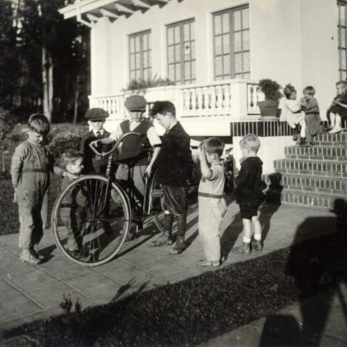 [Group of children playing outside the home of 682  Miramar Avenue]