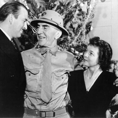 [Eddie Rickenbacker and two other people at the St. Francis Hotel]
