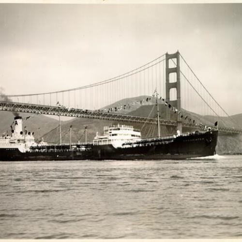[The "Associated" passing underneath the Golden Gate Bridge]