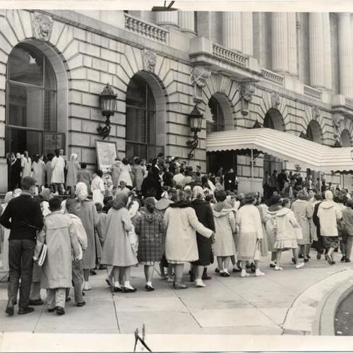 [Children lined up outside the San Francisco Opera House]