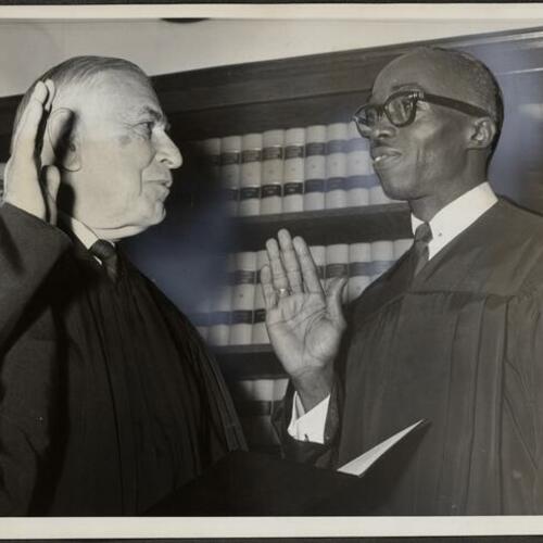 Judge Joseph Gamble Kennedy being sworn in by Chief Justice Phil S. Gibson
