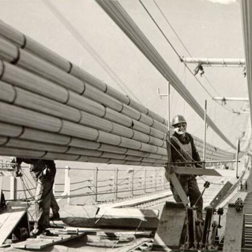 [Construction workers on the Golden Gate Bridge]