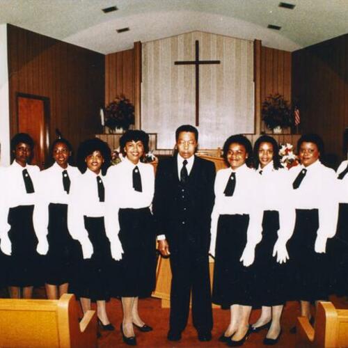 [Pastor Clarence E. Scott with young adult ushers in old church]