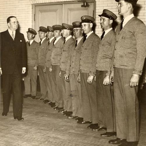 [Postmaster W.H. McCarthy inspecting a detachment of San Francisco mail carriers in their new uniforms]