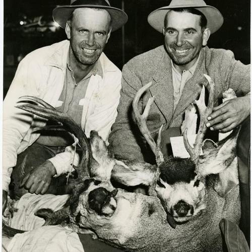 [Deer hunters Don Campbell and J. Cabral]