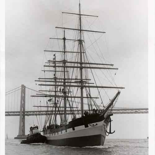 [Sailing ship "Balclutha" traveling past the Bay Bridge]