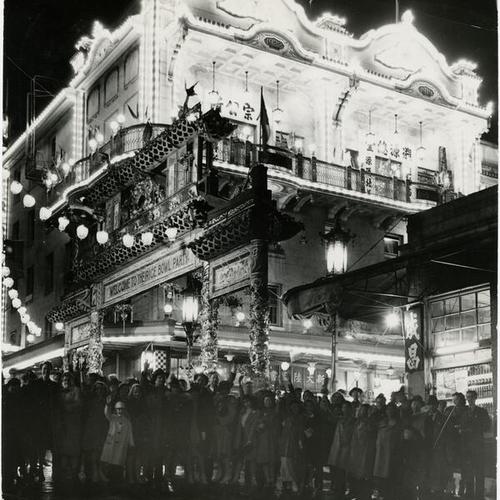 [Crowd of people gathered for the Rice Bowl Party in Chinatown]