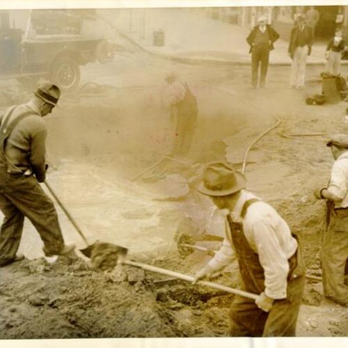 [Workers repairing a broken water main in the Richmond District]