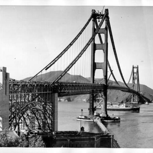 [Japanese liner, Asama Maru, passing under the nearly completed Golden Gate Bridge]
