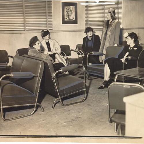[Group of women relaxing in a lounge at the Emporium department store]