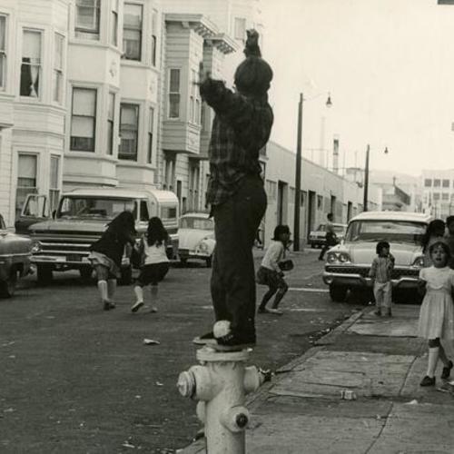 [Children playing in the street in South of Market neighborhood]