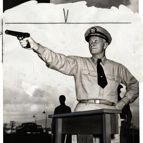 [Admiral Chester W. Nimitz, commander of the United States Pacific Fleet, practicing on the pistol range in Pearl Harbor]
