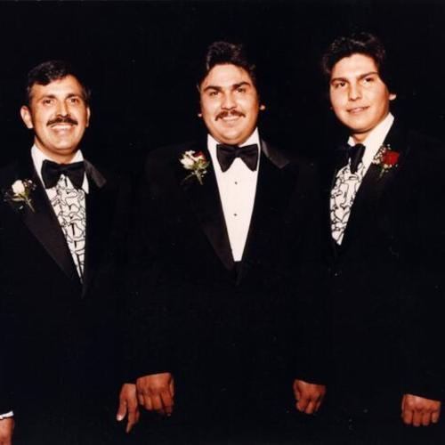 [Three brothers at a wedding]