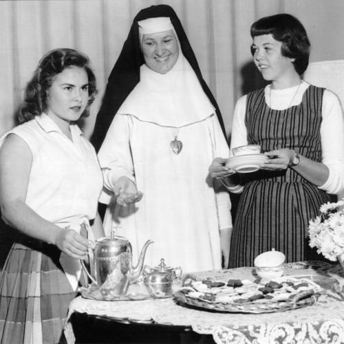 [Sister Mary Claude with two teenage girls at the Convent of the Good Shepherd]