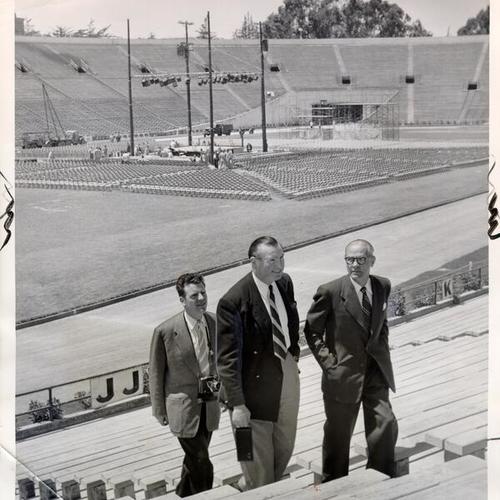 [John Simpson, E. J. Waltham and E. Andrews at Kezar Stadium prior to a championship heavyweight boxing match between Rocky Marciano and Don Cockell]