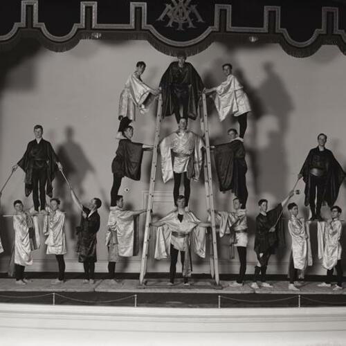 Stage portrait of actors in costume at Y. M. C. A. auditorium