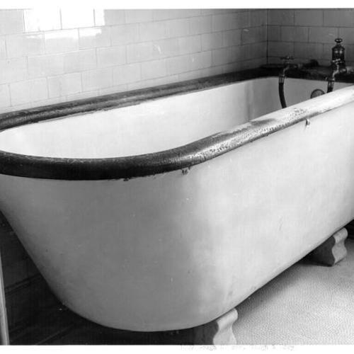 [Bathtub inside 1007 Gough Street, northwest corner of Gough and Eddy]