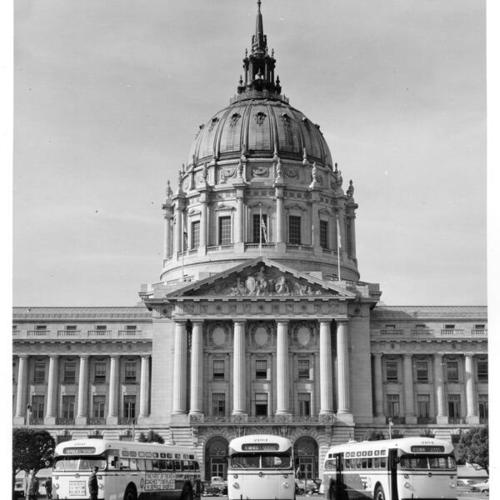 [Three Muni buses parked in front of City Hall]