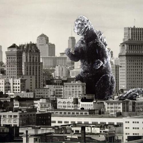 [View of downtown with Godzilla superimposed]