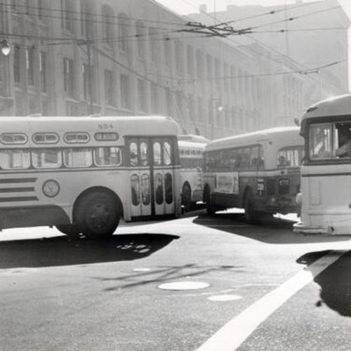 [Muni buses at the intersection of 5th and Mission streets]