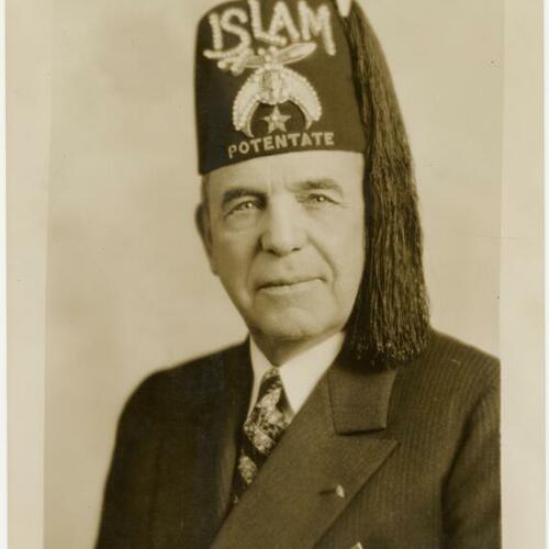 William L. Hughson in Shriner's potentate hat