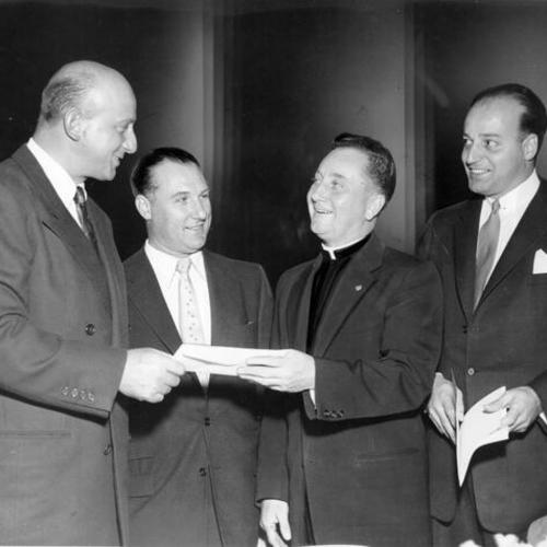 [Joseph Alioto with "Father Larry" Byrne, Ralph Montali, and Judge John B. Molinari]