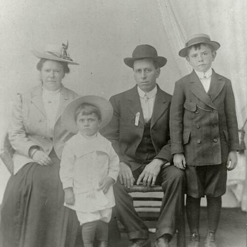 [Family portrait of William Jr., Bertha, Augie and William]