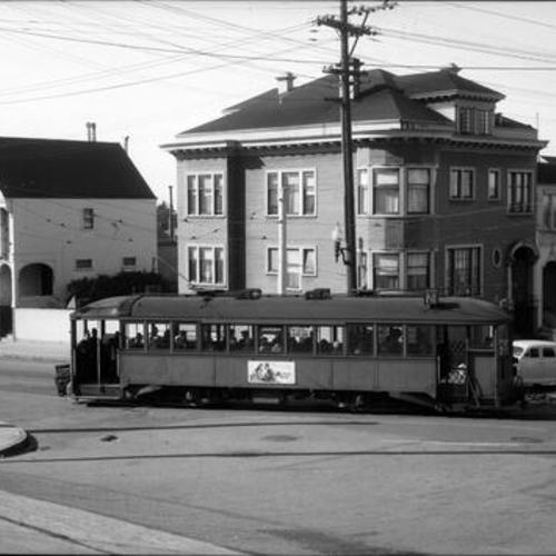 [Irving street and Arguello boulevard looking northwest at outbound Muni "N" line car 113]