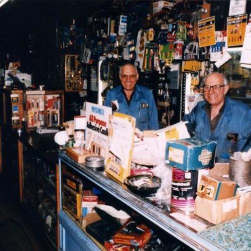 [Brothers Joseph and Marvin at Workingman's Headquarters hardware store]