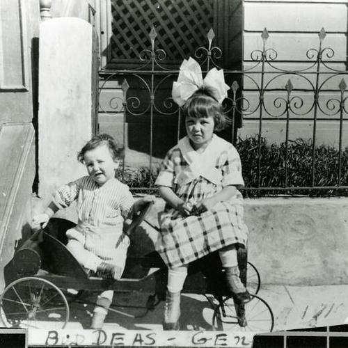 [Portrait of children in front of house on Treat Street]