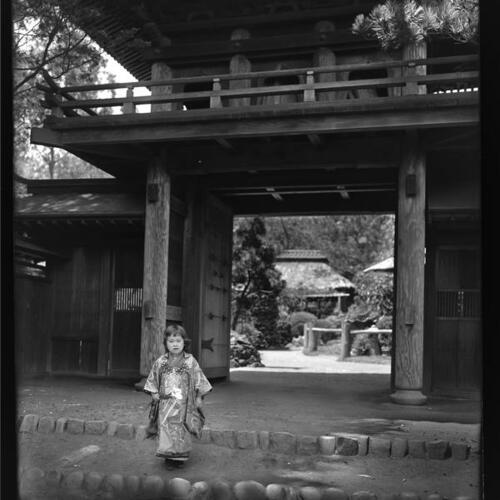 Japanese Tea Garden with child standing at front gate