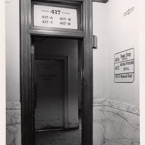 [Directory sign above door for rooms 417-A through 417-D in Old Hall of Justice]