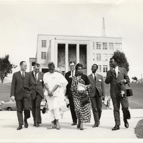 [Harold Spears conducting tour of City College during Africa Week]