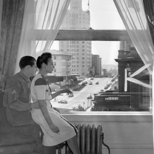 [Corporal Lloyd Griffiths and his wife Mary enjoying the Nob Hill view from their Fairmont Hotel suite]
