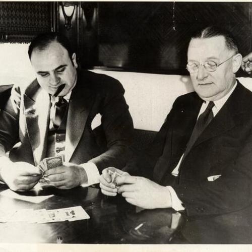 [Al Capone (left) and Marshal Harry Laubenheimer]