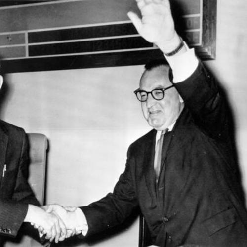 [Assembly Speaker Ralph Brown (D-Modesto) and Gov. Edmund G. Brown celebrate the end of the 1959 session of the legislature]