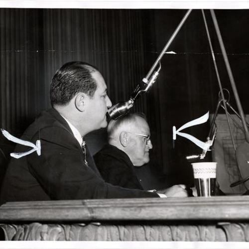 [Supervisors William C. Blake (left) and James Leo Halley hearing protests against proposed Western freeway]