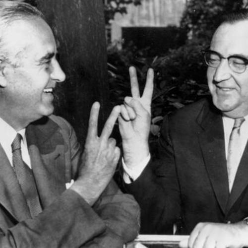[Attorney General Edmund G. (Pat) Brown (right) and New York Governor Averell Harriman give the victory sign]