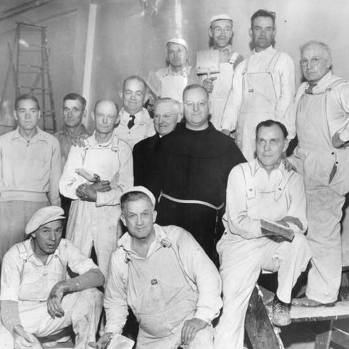 [Father Alfred Boeddeker and volunteer painters]