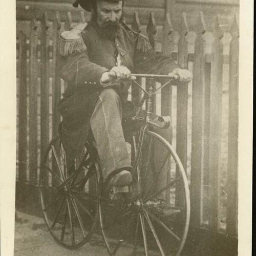 [Emperor Norton riding a bicycle.]